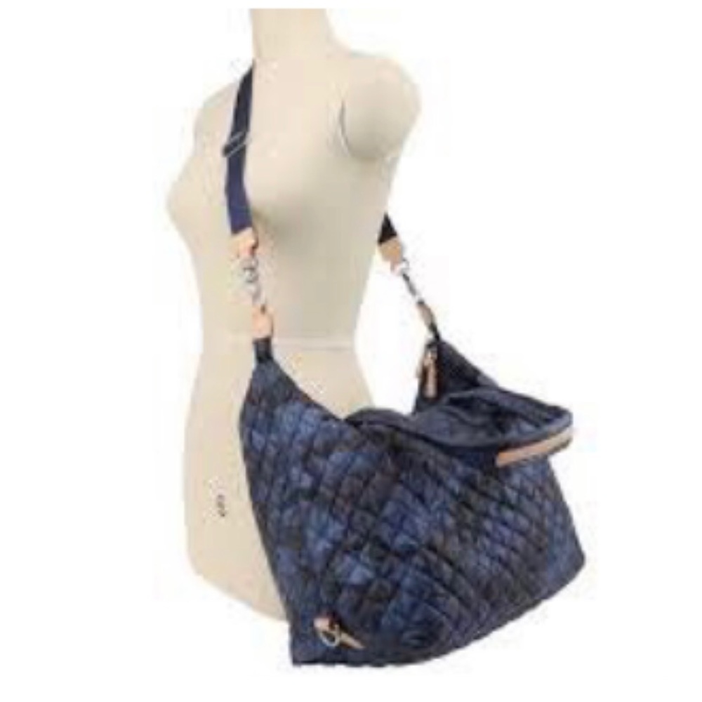 Brand new MZ Wallace Large Sutton blue camp bag with three zip up pouches